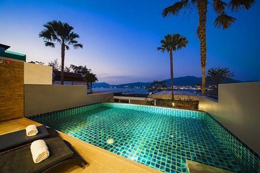 Rooftop pool night view at Atika Villas in Patong Beach